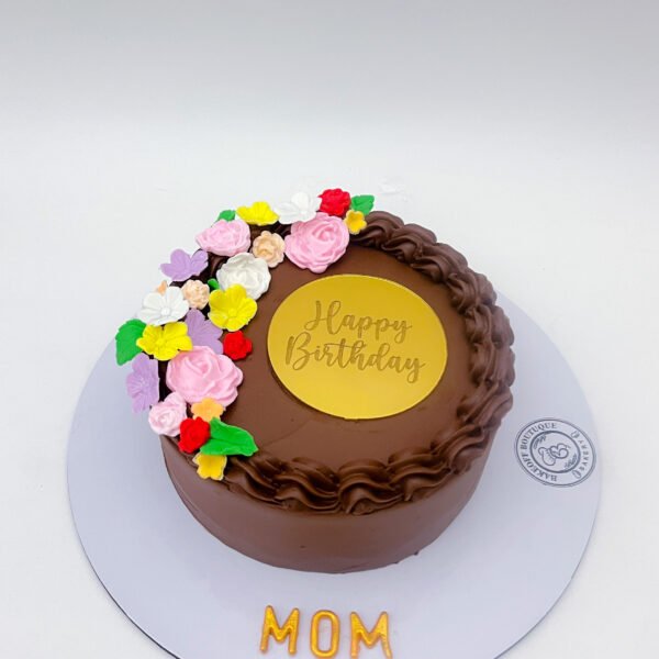 Delicious Chocolate Truffle Cake with chocolate ganache and custom decorations for birthdays and celebrations