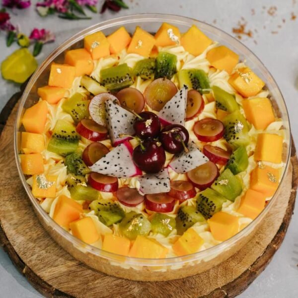Fresh Fruit Tres Leches Christmas Cake with seasonal fruits and creamy layers