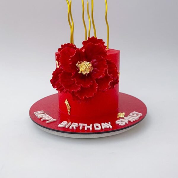 Chocolate Truffle Queen Birthday Cake with gold accents and crown topper