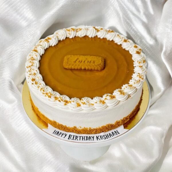 Lotus Biscoff Cake with creamy layers and crunchy Biscoff topping