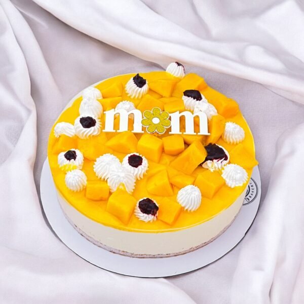 Mango Magic Cheesecake with fresh Alphonso mango topping and creamy cheesecake base